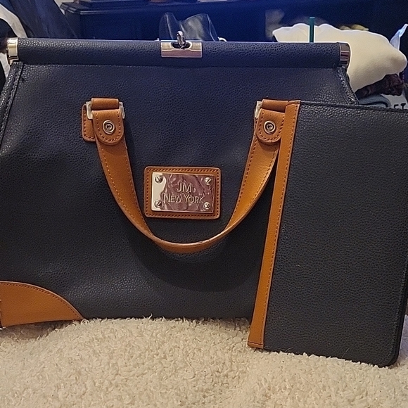 Black and Tan Satchel with Structured Shape and Sturdy Material - Picture 1 of 12